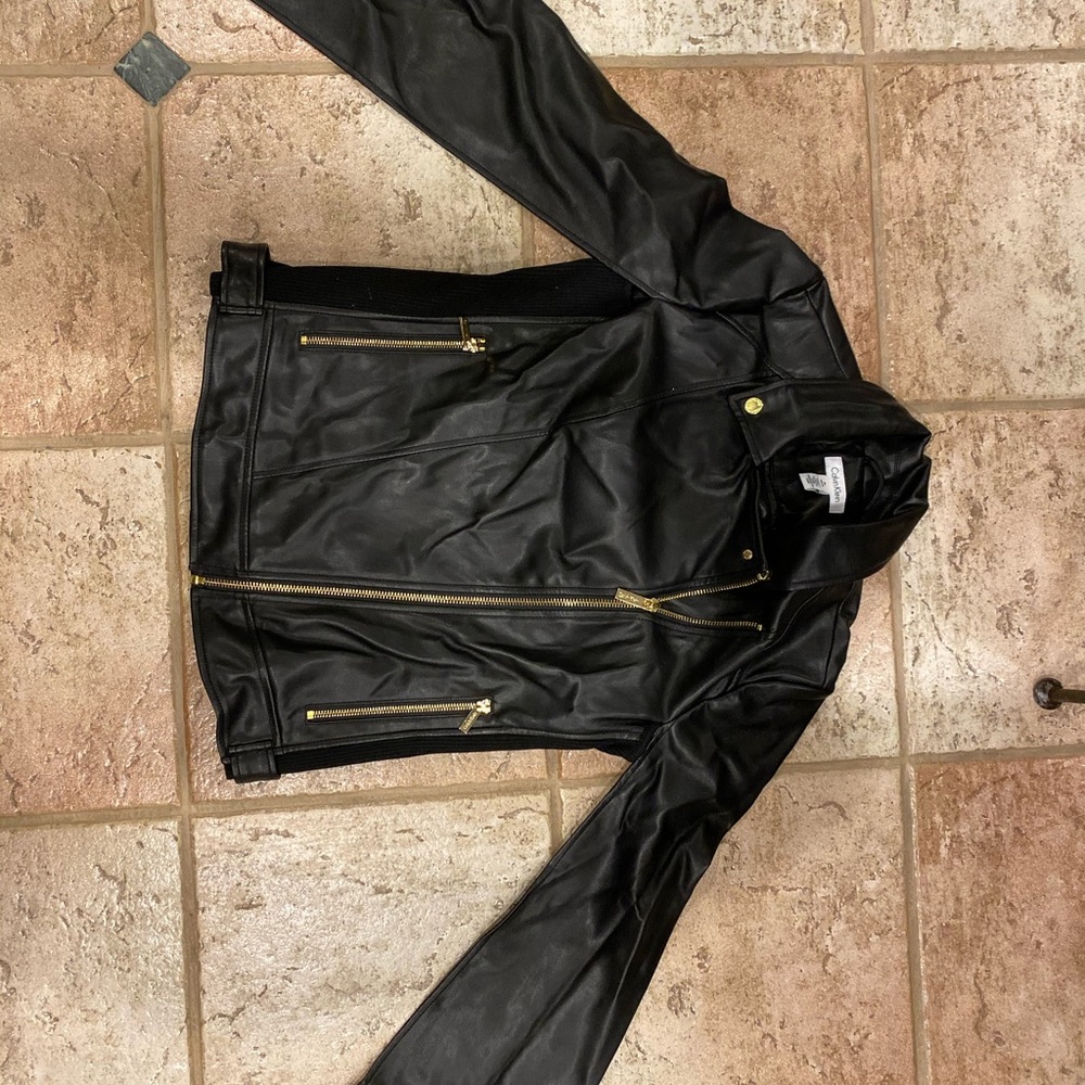 Leather jacket with open arms